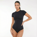 Black short-sleeve sculpting bodysuit with a crew neckline and high-cut leg. Smooth, flattering, and perfect for layering or wearing solo.